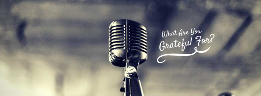 old timey microphone with text overlay: what are you grateful for?